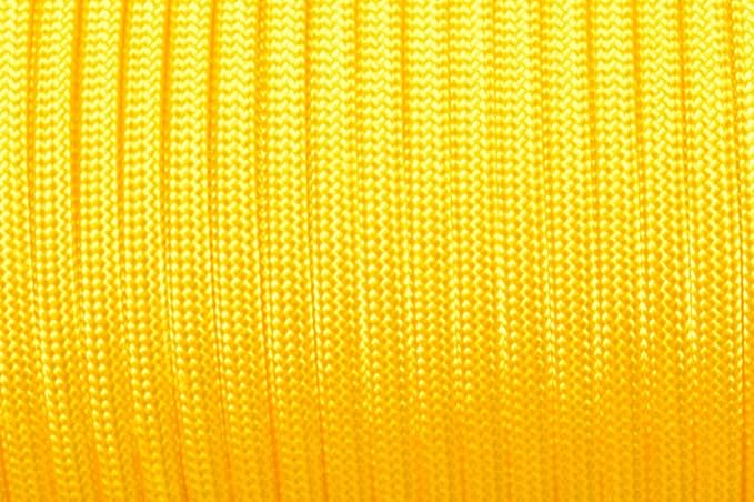 BORED? PARACORD! 550 lb Paracord – Ideal for Crafting, DIY Projects, Camping, Military & Active Outdoors – 300+ Colors – Tactical Parachute Cord Type III – Strong - Yellow 50 Feet